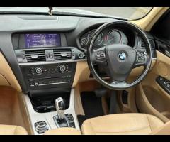 BMW X3 FINISHED IN SILVER METALLIC AND COMPLIMENTED WITH FULL BEIGE LEATHER INTERIOR. FULL SERVICE H - 15