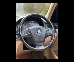 BMW X3 FINISHED IN SILVER METALLIC AND COMPLIMENTED WITH FULL BEIGE LEATHER INTERIOR. FULL SERVICE H - 32