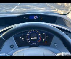 Honda Civic This 2009 Honda Civic i VTEC SE Plus offers a compelling blend of performance and practi - 31