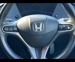 Honda Civic This 2009 Honda Civic i VTEC SE Plus offers a compelling blend of performance and practi - 32