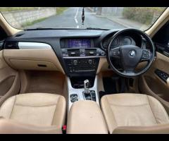 BMW X3 FINISHED IN SILVER METALLIC AND COMPLIMENTED WITH FULL BEIGE LEATHER INTERIOR. FULL SERVICE H - 14