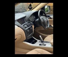 BMW X3 FINISHED IN SILVER METALLIC AND COMPLIMENTED WITH FULL BEIGE LEATHER INTERIOR. FULL SERVICE H - 18