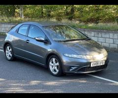 Honda Civic This 2009 Honda Civic i VTEC SE Plus offers a compelling blend of performance and practi