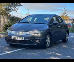 Honda Civic This 2009 Honda Civic i VTEC SE Plus offers a compelling blend of performance and practi - 9