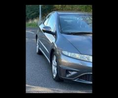 Honda Civic This 2009 Honda Civic i VTEC SE Plus offers a compelling blend of performance and practi - 12