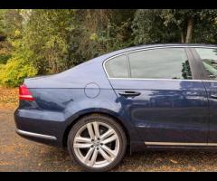 Volkswagen Passat This Volkswagen Passat TDI Executive Style from 2014 offers exceptional value with - 35