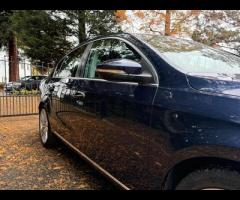 Volkswagen Passat This Volkswagen Passat TDI Executive Style from 2014 offers exceptional value with - 48