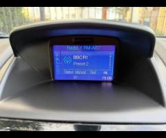 Ford Fiesta This 2013 Ford Fiesta T Titanium X offers an exceptional blend of efficiency and comfort - 32