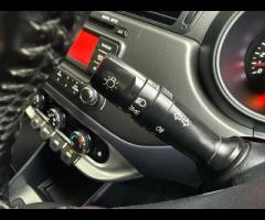 Kia Rio Discover this 2014 Kia Rio VR7, a remarkably well kept example with an exceptionally low mil - 26