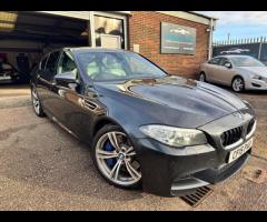 BMW M5 THIS POWERFUL BMW M5 V8 DELIVERS EXHILIRATING PERFORMANCE AND GIVES YOU PRESTIGE AND LUXURY A