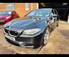 BMW M5 THIS POWERFUL BMW M5 V8 DELIVERS EXHILIRATING PERFORMANCE AND GIVES YOU PRESTIGE AND LUXURY A - 2