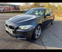 BMW M5 THIS POWERFUL BMW M5 V8 DELIVERS EXHILIRATING PERFORMANCE AND GIVES YOU PRESTIGE AND LUXURY A - 4