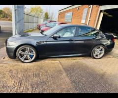 BMW M5 THIS POWERFUL BMW M5 V8 DELIVERS EXHILIRATING PERFORMANCE AND GIVES YOU PRESTIGE AND LUXURY A - 5