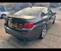 BMW M5 THIS POWERFUL BMW M5 V8 DELIVERS EXHILIRATING PERFORMANCE AND GIVES YOU PRESTIGE AND LUXURY A - 11