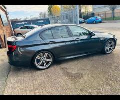 BMW M5 THIS POWERFUL BMW M5 V8 DELIVERS EXHILIRATING PERFORMANCE AND GIVES YOU PRESTIGE AND LUXURY A - 12