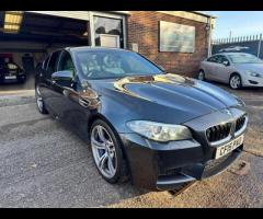 BMW M5 THIS POWERFUL BMW M5 V8 DELIVERS EXHILIRATING PERFORMANCE AND GIVES YOU PRESTIGE AND LUXURY A - 15