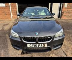 BMW M5 THIS POWERFUL BMW M5 V8 DELIVERS EXHILIRATING PERFORMANCE AND GIVES YOU PRESTIGE AND LUXURY A - 16