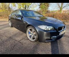 BMW M5 THIS POWERFUL BMW M5 V8 DELIVERS EXHILIRATING PERFORMANCE AND GIVES YOU PRESTIGE AND LUXURY A - 19