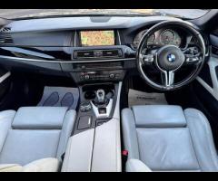 BMW M5 THIS POWERFUL BMW M5 V8 DELIVERS EXHILIRATING PERFORMANCE AND GIVES YOU PRESTIGE AND LUXURY A - 29