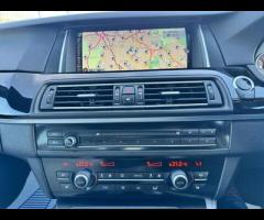 BMW M5 THIS POWERFUL BMW M5 V8 DELIVERS EXHILIRATING PERFORMANCE AND GIVES YOU PRESTIGE AND LUXURY A - 30