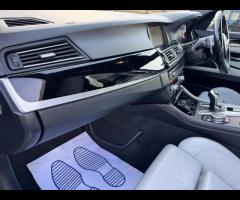 BMW M5 THIS POWERFUL BMW M5 V8 DELIVERS EXHILIRATING PERFORMANCE AND GIVES YOU PRESTIGE AND LUXURY A - 31