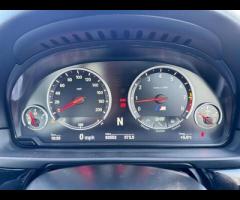 BMW M5 THIS POWERFUL BMW M5 V8 DELIVERS EXHILIRATING PERFORMANCE AND GIVES YOU PRESTIGE AND LUXURY A - 32