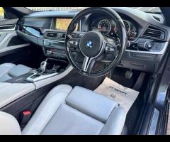 BMW M5 THIS POWERFUL BMW M5 V8 DELIVERS EXHILIRATING PERFORMANCE AND GIVES YOU PRESTIGE AND LUXURY A - 33