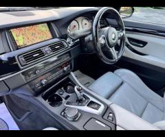 BMW M5 THIS POWERFUL BMW M5 V8 DELIVERS EXHILIRATING PERFORMANCE AND GIVES YOU PRESTIGE AND LUXURY A - 35