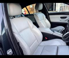 BMW M5 THIS POWERFUL BMW M5 V8 DELIVERS EXHILIRATING PERFORMANCE AND GIVES YOU PRESTIGE AND LUXURY A - 37