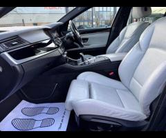 BMW M5 THIS POWERFUL BMW M5 V8 DELIVERS EXHILIRATING PERFORMANCE AND GIVES YOU PRESTIGE AND LUXURY A - 39