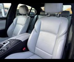 BMW M5 THIS POWERFUL BMW M5 V8 DELIVERS EXHILIRATING PERFORMANCE AND GIVES YOU PRESTIGE AND LUXURY A - 40