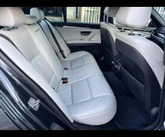 BMW M5 THIS POWERFUL BMW M5 V8 DELIVERS EXHILIRATING PERFORMANCE AND GIVES YOU PRESTIGE AND LUXURY A - 47