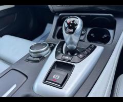BMW M5 THIS POWERFUL BMW M5 V8 DELIVERS EXHILIRATING PERFORMANCE AND GIVES YOU PRESTIGE AND LUXURY A - 52