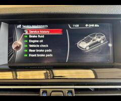 BMW M5 THIS POWERFUL BMW M5 V8 DELIVERS EXHILIRATING PERFORMANCE AND GIVES YOU PRESTIGE AND LUXURY A - 62