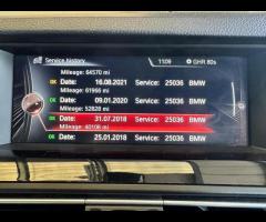 BMW M5 THIS POWERFUL BMW M5 V8 DELIVERS EXHILIRATING PERFORMANCE AND GIVES YOU PRESTIGE AND LUXURY A - 64