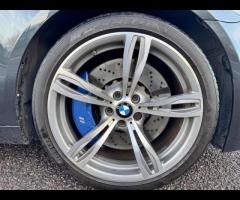 BMW M5 THIS POWERFUL BMW M5 V8 DELIVERS EXHILIRATING PERFORMANCE AND GIVES YOU PRESTIGE AND LUXURY A - 67