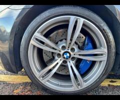 BMW M5 THIS POWERFUL BMW M5 V8 DELIVERS EXHILIRATING PERFORMANCE AND GIVES YOU PRESTIGE AND LUXURY A - 68