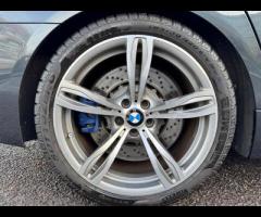 BMW M5 THIS POWERFUL BMW M5 V8 DELIVERS EXHILIRATING PERFORMANCE AND GIVES YOU PRESTIGE AND LUXURY A - 69