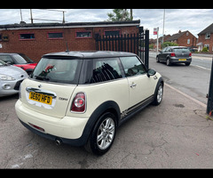 Mini Hatch 1.6 Cooper Hatch finished in White (Manual), 67543 miles with Black Cloth interior, - 3